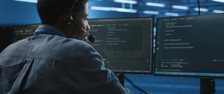 Cyber security analyst monitoring digital threats