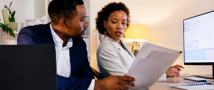 Business professionals discussing tax planning vs tax evasion in South Africa