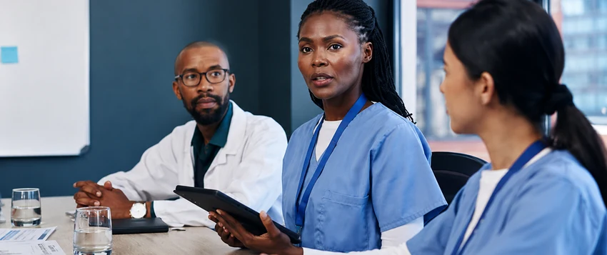 Healthcare professionals discussing healthcare management and leadership in South Africa
