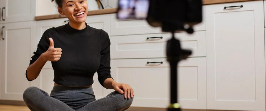 Young South African influencer recording professional social media content with a camera