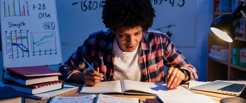 Student using mathematics to solve computer science and IT problems