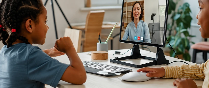 Online school learners attending a live virtual class with a teacher