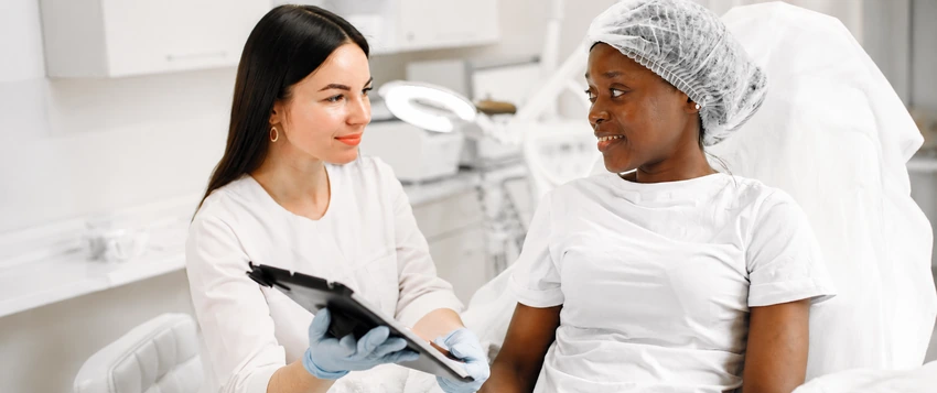 Healthcare professional discussing sexual and reproductive health with a patient
