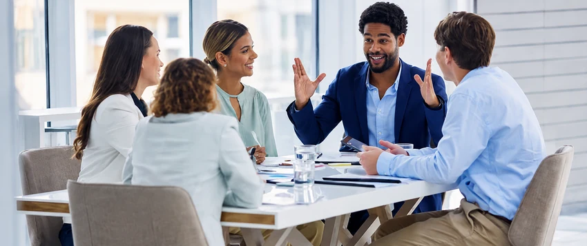Business manager leading a team during a strategy meeting