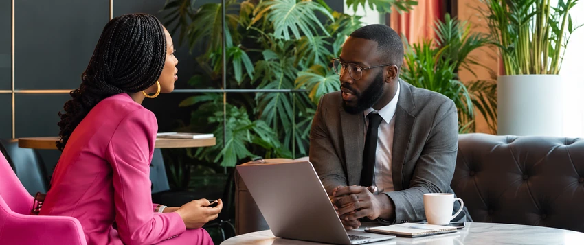African public sector professionals discussing public management strategy in a professional meeting