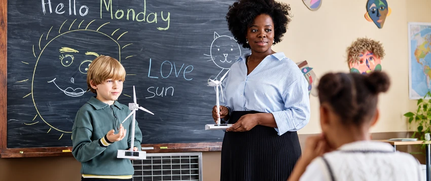 Teacher guiding students during an interactive classroom lesson